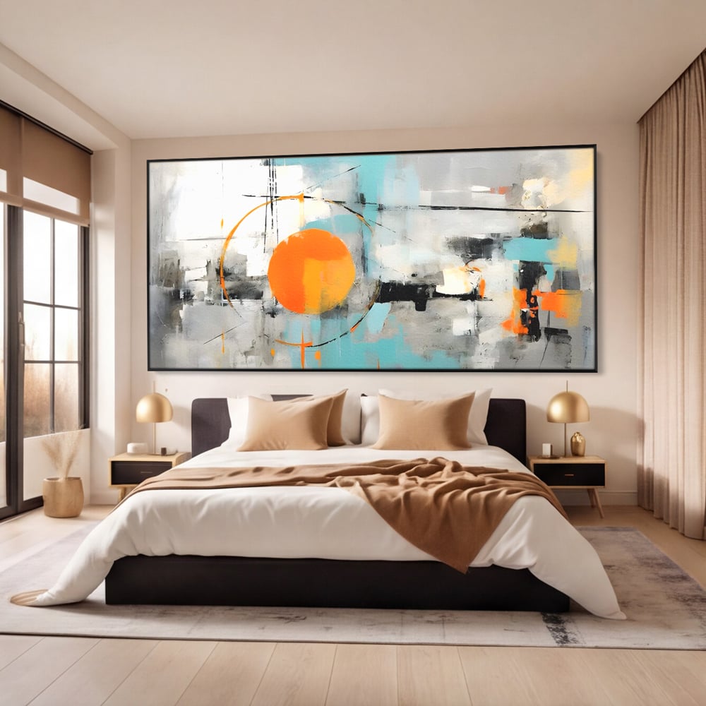 Tablou canvas cu pictura abstracta cu cerc portocaliu, in rama de aluminiu negru, pe perete intr-un dormitor